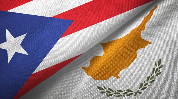 Puerto Rico en Cyprus twee vlaggen textiel doek, stof textuur — Stockfoto
