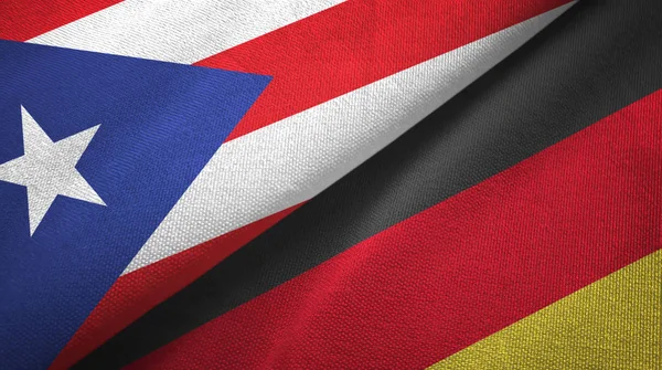 Puerto Rico en Duitsland twee vlaggen textiel doek, stof textuur — Stockfoto