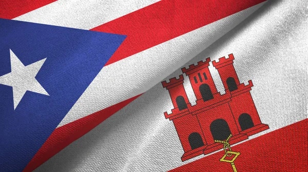 Puerto Rico y Gibraltar dos banderas de tela textil, textura de tela — Foto de Stock