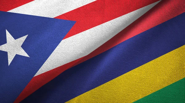 Puerto Rico en Mauritius twee vlaggen textiel doek, stof textuur — Stockfoto