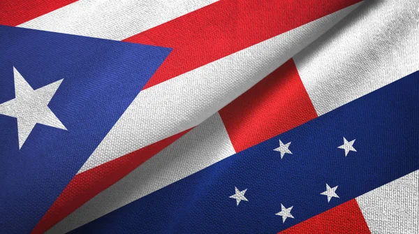 Puerto Rico en Nederlandse Antillen twee vlaggen textiel doek, stof textuur — Stockfoto