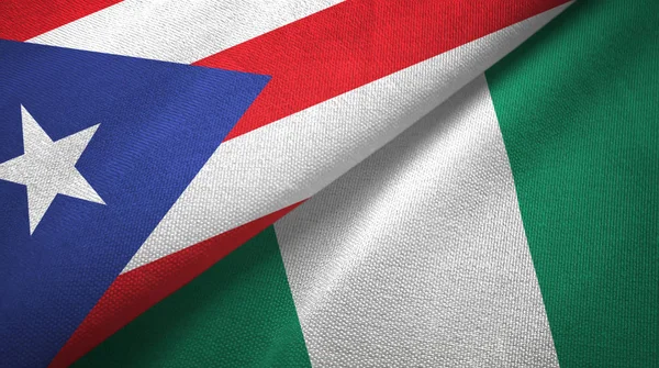Puerto Rico en Nigeria twee vlaggen textiel doek, stof textuur — Stockfoto