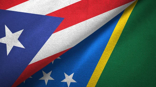 Puerto Rico and Solomon Islands two flags textile cloth, fabric texture