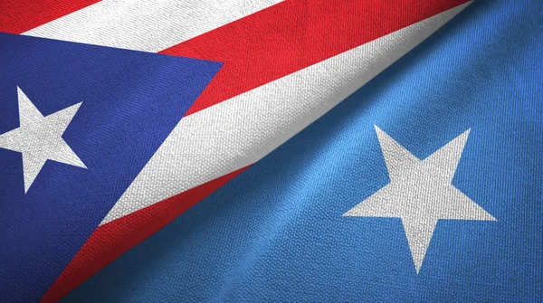 Puerto Rico en Somalië twee vlaggen textiel doek, stof textuur — Stockfoto