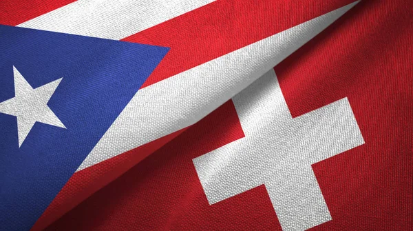 Puerto Rico y Suiza dos banderas de tela textil, textura de tela —  Fotos de Stock