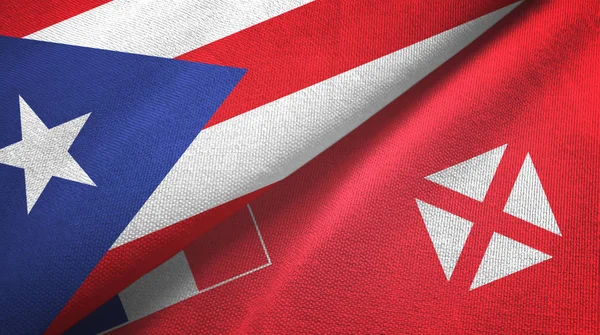 Puerto Rico y Wallis y Futuna dos banderas de tela textil, textura de tela —  Fotos de Stock