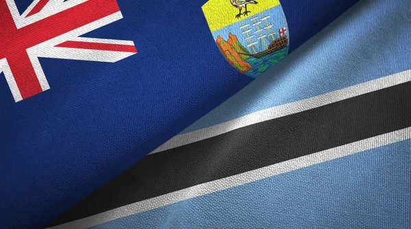 Sankt Helena och Botswana två flaggor textilduk, textur — Stockfoto