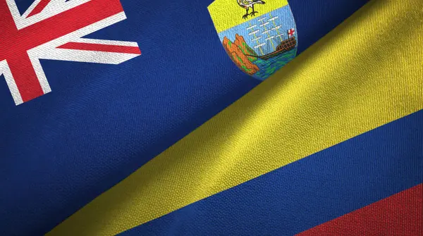Santa Helena y Colombia dos banderas de tela textil, textura de tela — Foto de Stock