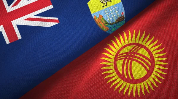 Santa Helena y Kirguistán dos banderas tela textil, textura de la tela — Foto de Stock