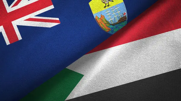 Santa Helena y Sudán dos banderas tela textil, textura de la tela — Foto de Stock
