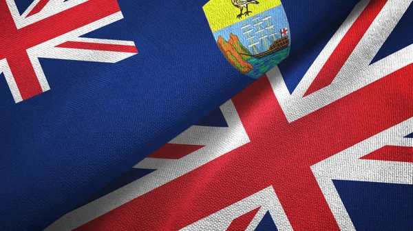 Saint Helena en het Verenigd Koninkrijk twee vlaggen textiel doek, stof textuur — Stockfoto