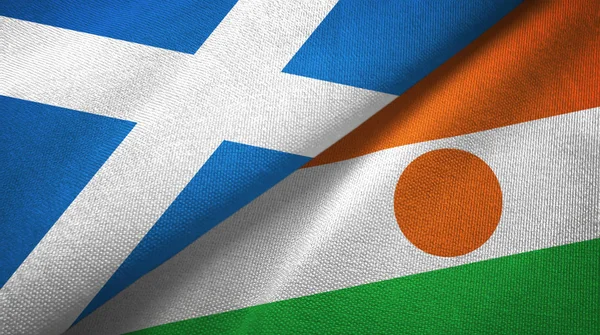 Scotland and Niger two flags textile cloth, fabric texture — 图库照片