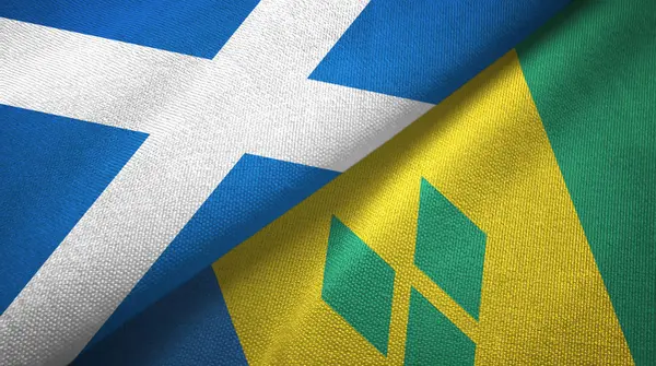 Skotsko a Svatý Vincenc a Grenadiny dvě vlajkové textilní látky — Stock fotografie