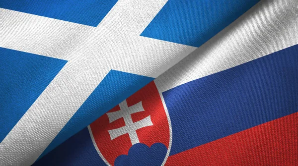 Шотландія і Словаччина два прапори текстильної тканини, текстура тканини. — стокове фото