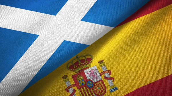 stock image Scotland and Spain two flags textile cloth, fabric texture