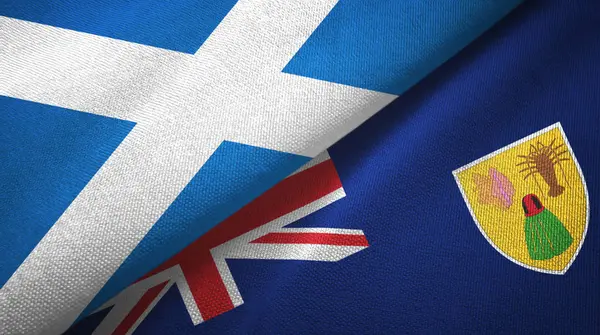 Escocia y las Islas Turcas y Caicos dos banderas tela textil, textura de la tela — Foto de Stock