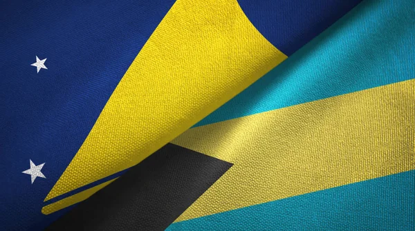 Tokelau y Bahamas dos banderas tela textil, textura de la tela —  Fotos de Stock