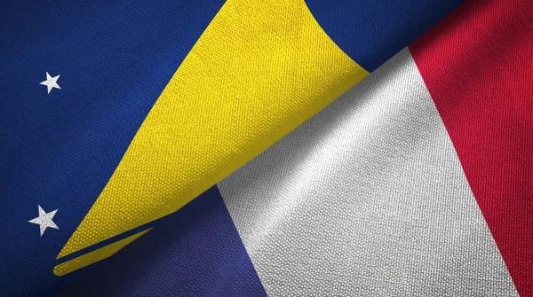 Tokelau en Frankrijk twee vlaggen textiel doek, stof textuur — Stockfoto