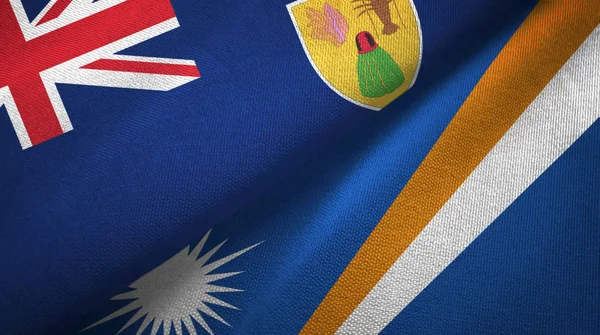 Törökök és Caicos-szigetek és Marshall-szigetek két zászló — Stock Fotó