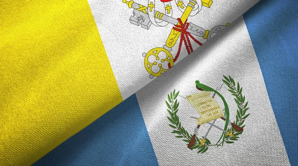 Vaticaan en Guatemala twee vlaggen textiel doek, stof textuur — Stockfoto