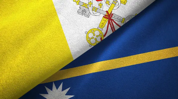 Watykan i Nauru dwie flagi tkaniny tekstylne, tekstura tkaniny — Zdjęcie stockowe