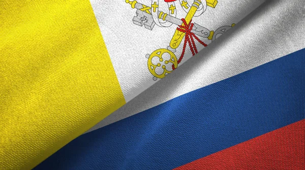 Watykan i Rosja dwie flagi tkaniny tekstylne, tekstura tkaniny — Zdjęcie stockowe