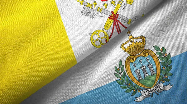 Watykan i San Marino dwie flagi tkaniny tekstylne, tekstura tkaniny — Zdjęcie stockowe