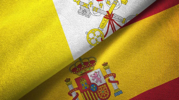 Βατικανό και Ισπανία δύο σημαίες ύφασμα, υφασμάτινη υφή — Φωτογραφία Αρχείου