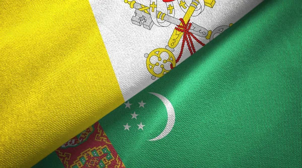 Watykan i Turkmenistan dwie flagi tkaniny tekstylne, tekstura tkaniny — Zdjęcie stockowe