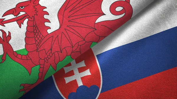 Wales and Slovakia two flags textile cloth, fabric texture — Stock Photo, Image