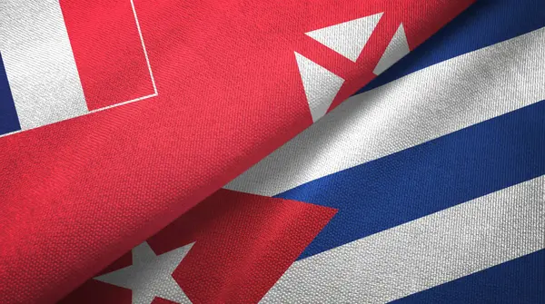 Wallis e Futuna e Cuba duas bandeiras de pano têxtil, textura de tecido — Fotografia de Stock