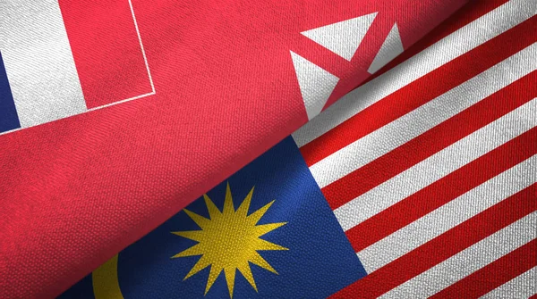 Wallis and Futuna and Malaysia two flags textile cloth, fabric texture — Stock Photo, Image