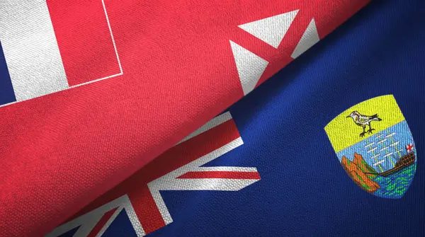 Wallis y Futuna y Santa Helena dos banderas de tela textil, textura de tela — Foto de Stock