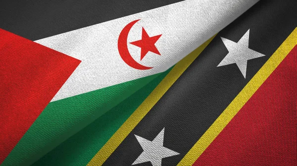 Western Sahara and Saint Kitts and Nevis two flags textile cloth, fabric texture