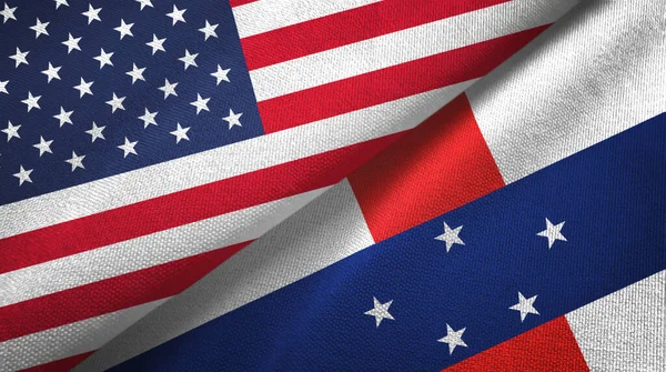 Estados Unidos y las Antillas Holandesas dos banderas tela textil, textura de la tela — Foto de Stock