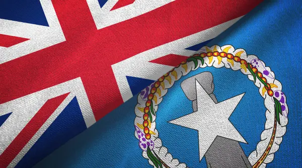 Royaume-Uni et Îles Mariannes du Nord deux drapeaux tissu textile — Photo