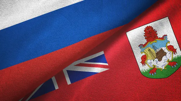 Ryssland och Bermuda två flaggor textilduk, textur — Stockfoto