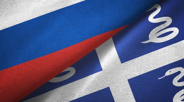 Rusia y Martinica serpiente dos banderas tela textil, textura de la tela — Foto de Stock