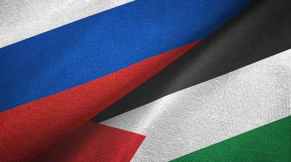 Russia and Palestine two flags textile cloth, fabric texture