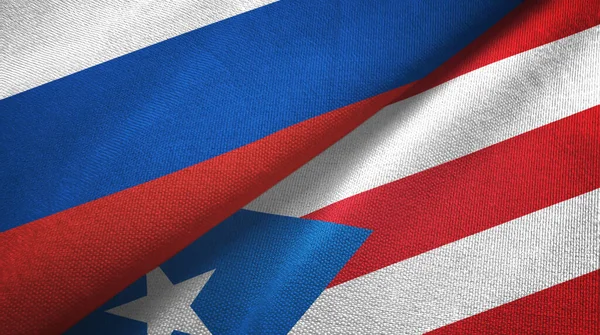 Ρωσία και Πουέρτο Ρίκο δύο σημαίες ύφασμα, υφασμάτινη υφή — Φωτογραφία Αρχείου