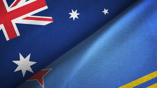 Australia y Aruba dos banderas tela textil, textura de la tela — Foto de Stock