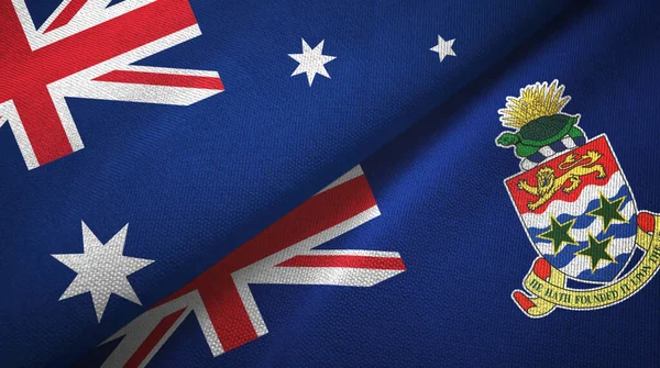 Australia e Islas Caimán dos banderas tela textil, textura de la tela — Foto de Stock