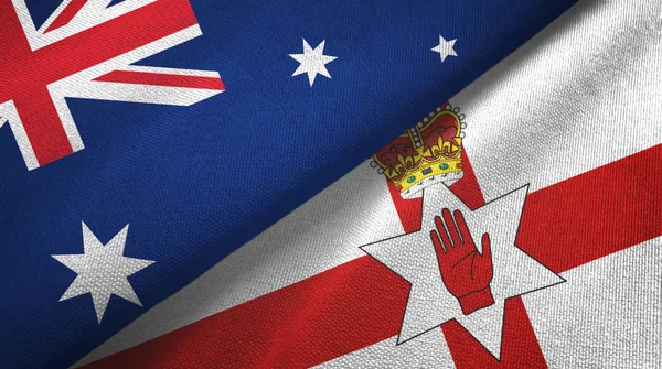 Australia i Irlandia Północna dwie flagi tkaniny tekstylne, tekstura tkaniny — Zdjęcie stockowe