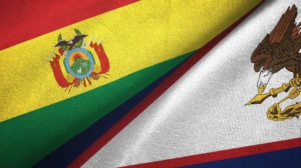Bolivia och amerikanska Samoa två flaggor textil duk, textur — Stockfoto