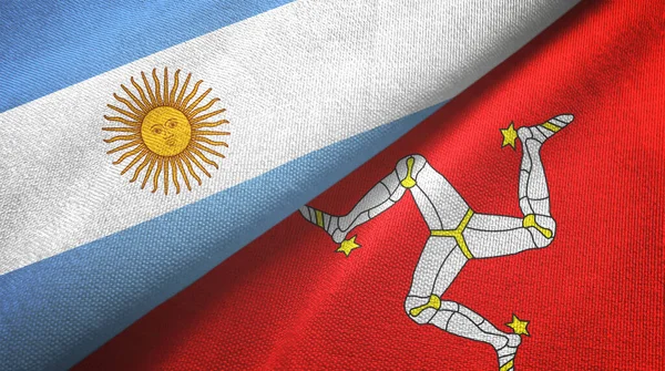 Argentina a ostrov Mann dvě vlajky textilní tkaniny, textura tkaniny — Stock fotografie