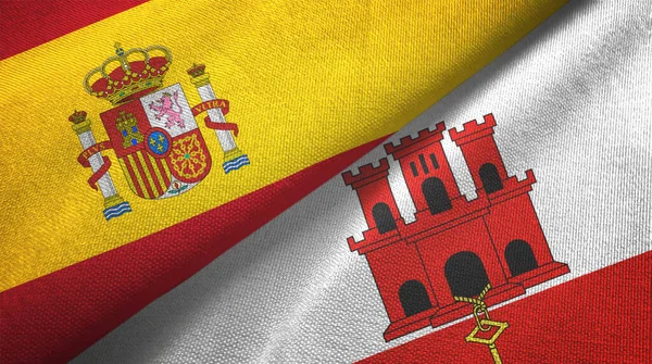 Spain and Gibraltar two flags textile cloth, fabric texture — Stock Photo, Image