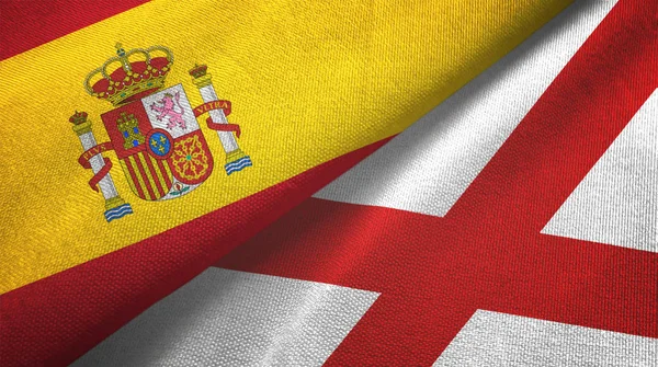 Spain and Northern Ireland two flags textile cloth, fabric texture — Stock Photo, Image