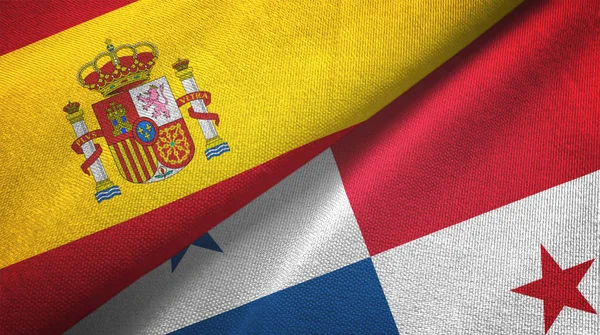 España y Panamá dos banderas de tela textil, textura de tela — Foto de Stock