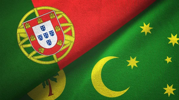 Portugal en Cocos Keeling Eilanden twee vlaggen textiel doek, stof textuur — Stockfoto