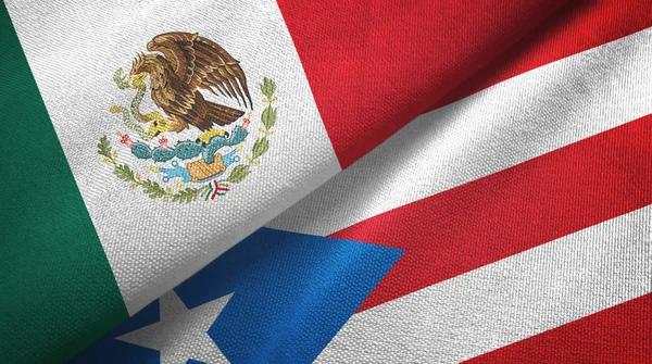 México y Puerto Rico dos banderas de tela textil, textura de tela — Foto de Stock